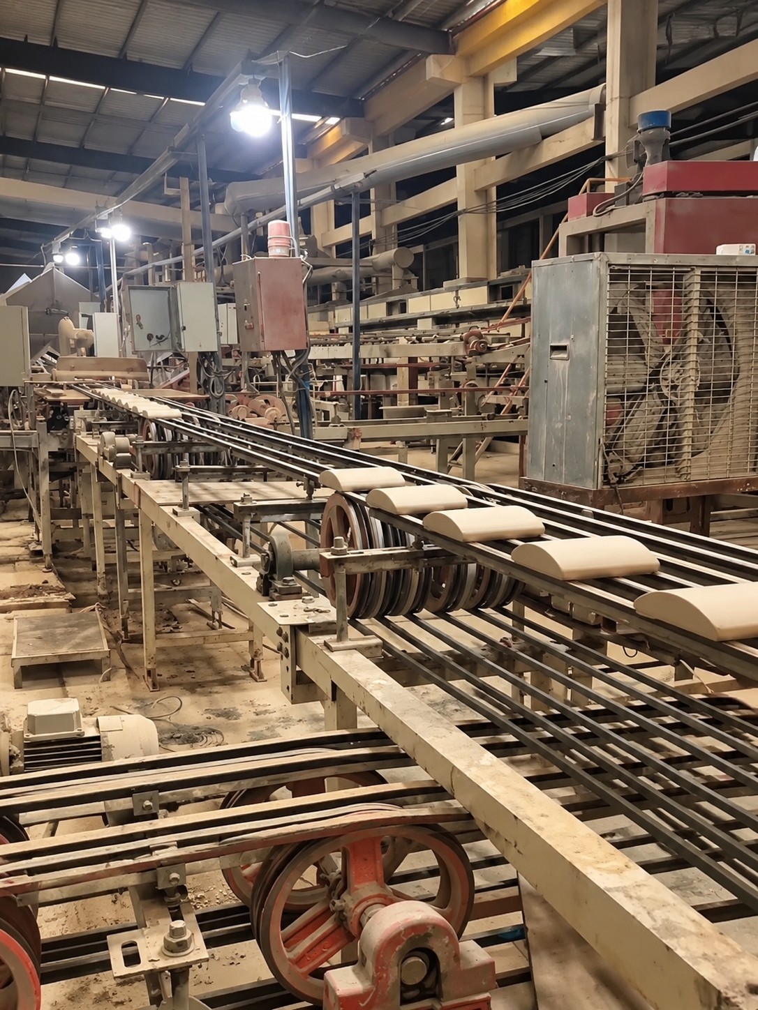 HUITLONG MOSAIC factory floor with a large continuous production line
